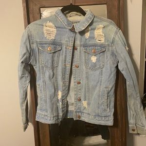 Distressed denim jacket
